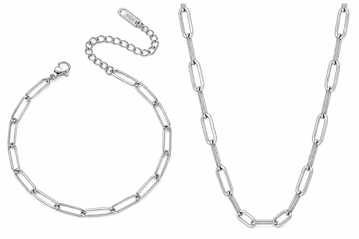 A silver paperclip chain necklace and matching extender chain with lobster clasp, displayed on a clean white background.