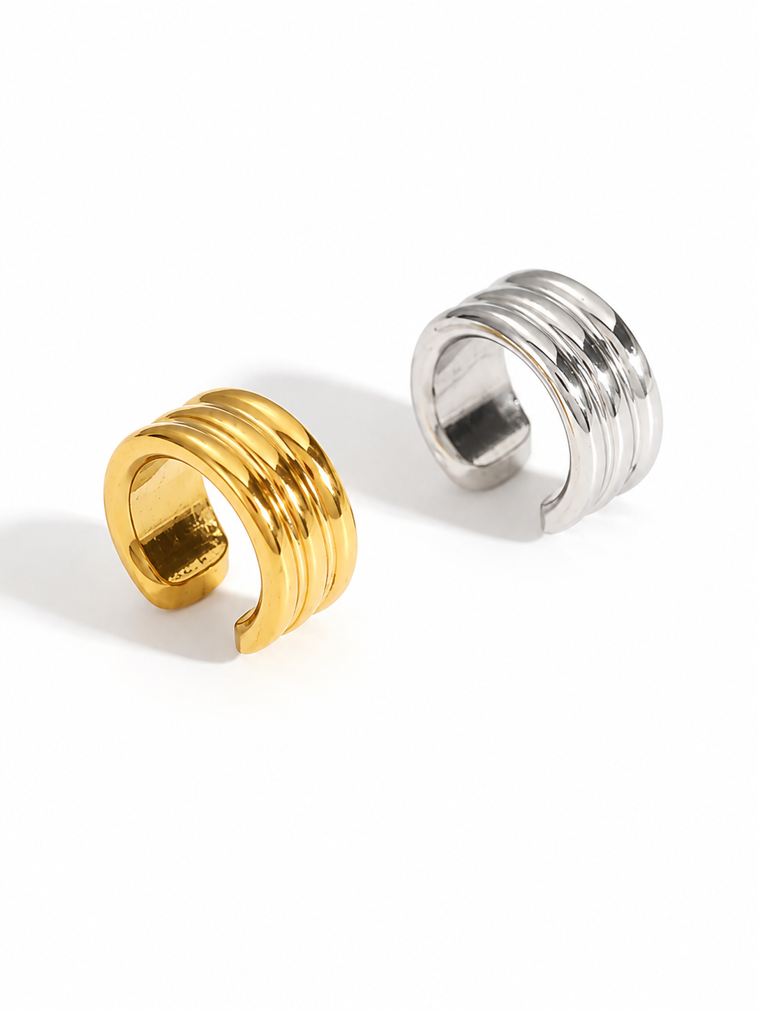 Gold and silver Mindfull Ear Cuffs in waterproof, hypoallergenic stainless steel with 18K gold plating, no piercing required.